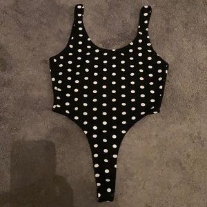A thong bodysuit 🔥